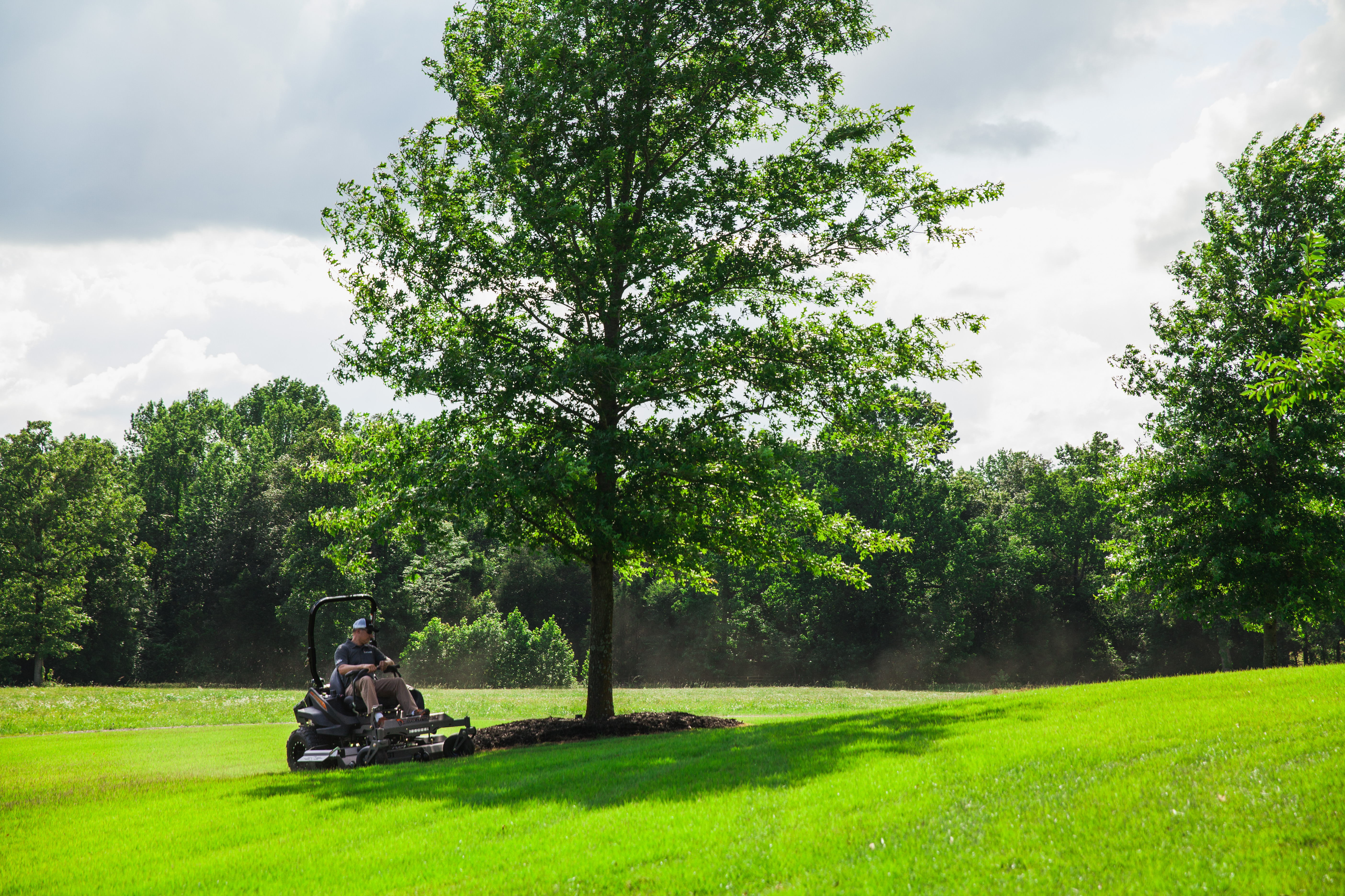 Take it slow on hills when riding your zero turn mower. 